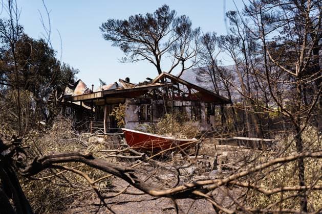 Residents return to wildfire-ravaged homes in western Attica PORTO GERMENO, WEST ATTICA, GREECE AUGUST 5, 2026: Extensive destruction caused by a major wildfire is seen in Porto Germeno, western Attica, four days after the fire swept through the area. More than 50 homes sustained damage ranging from partial destruction to complete collapse. Recovery and assessment operations continue as crews clear debris and inspection teams from Greece s General Secretariat for Natural Disaster Recovery evaluate damaged properties. Parts of the area remain without electricity and running water while restoration efforts continue. Porto Germeno Greece Copyright: x xRomanosxLioutasx xJNAxPressx