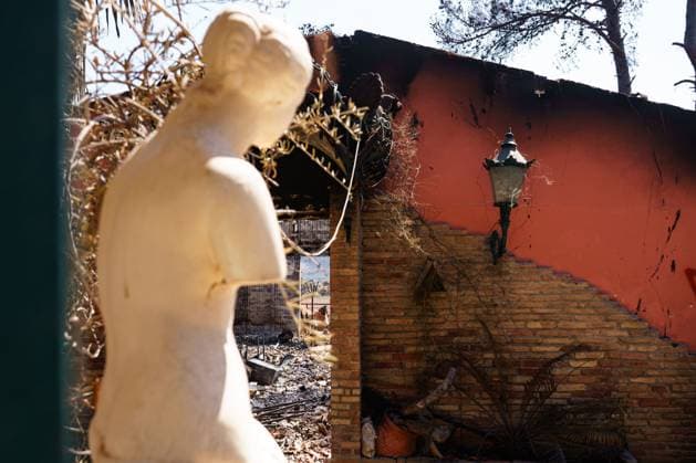 Residents return to wildfire-ravaged homes in western Attica PORTO GERMENO, WEST ATTICA, GREECE AUGUST 5, 2026: Extensive destruction caused by a major wildfire is seen in Porto Germeno, western Attica, four days after the fire swept through the area. More than 50 homes sustained damage ranging from partial destruction to complete collapse. Recovery and assessment operations continue as crews clear debris and inspection teams from Greece s General Secretariat for Natural Disaster Recovery evaluate damaged properties. Parts of the area remain without electricity and running water while restoration efforts continue. Porto Germeno Greece Copyright: x xRomanosxLioutasx xJNAxPressx