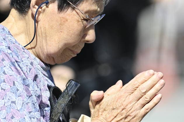 Japan marks 81st anniversary of the atomic bombing of Hiroshima HIROSHIMA, JAPAN - AUGUST 6 : A visitor prays in front of the cenotaph for atomic bomb victims at Peace Memorial Park following the Hiroshima Peace Memorial Ceremony in Hiroshima, Japan, on August 6, 2026. Japan marks the 81st anniversary of the atomic bombing of Hiroshima. David Mareuil Anadolu Hiroshima Japan. Editorial use only. Please get in touch for any other usage.  Copyright: x2026xAnadoluxDavidxMareuilx