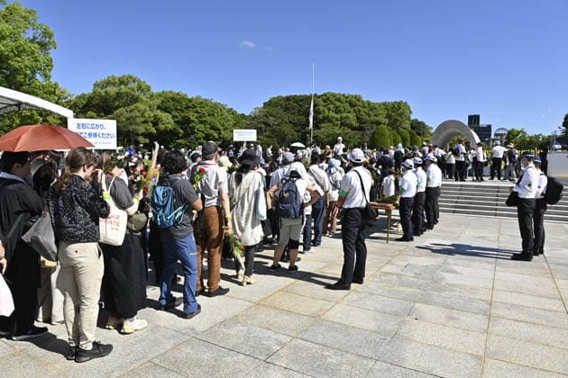 Japan marks 81st anniversary of the atomic bombing of Hiroshima HIROSHIMA, JAPAN - AUGUST 6 : People wait to pray in front of the cenotaph for atomic bomb victims at Peace Memorial Park following the Hiroshima Peace Memorial Ceremony in Hiroshima, Japan, on August 6, 2026. Japan marks the 81st anniversary of the atomic bombing of Hiroshima. David Mareuil Anadolu Hiroshima Japan. Editorial use only. Please get in touch for any other usage.  Copyright: x2026xAnadoluxDavidxMareuilx
