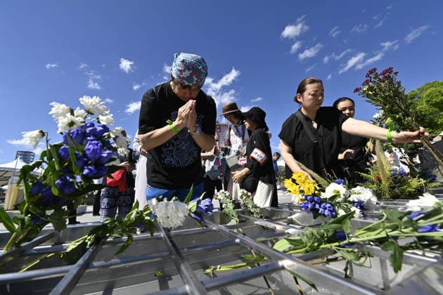 Japan marks 81st anniversary of the atomic bombing of Hiroshima HIROSHIMA, JAPAN - AUGUST 6 : People offer flowers and pray in front of the cenotaph for atomic bomb victims at Peace Memorial Park following the Hiroshima Peace Memorial Ceremony in Hiroshima, Japan, on August 6, 2026. Japan marks the 81st anniversary of the atomic bombing of Hiroshima. David Mareuil Anadolu Hiroshima Japan. Editorial use only. Please get in touch for any other usage.  Copyright: x2026xAnadoluxDavidxMareuilx