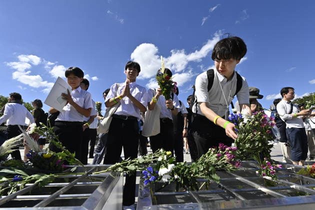 Japan marks 81st anniversary of the atomic bombing of Hiroshima HIROSHIMA, JAPAN - AUGUST 6 : People offer flowers and pray in front of the cenotaph for atomic bomb victims at Peace Memorial Park following the Hiroshima Peace Memorial Ceremony in Hiroshima, Japan, on August 6, 2026. Japan marks the 81st anniversary of the atomic bombing of Hiroshima. David Mareuil Anadolu Hiroshima Japan. Editorial use only. Please get in touch for any other usage.  Copyright: x2026xAnadoluxDavidxMareuilx