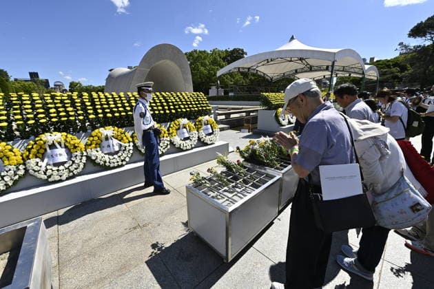 Japan marks 81st anniversary of the atomic bombing of Hiroshima HIROSHIMA, JAPAN - AUGUST 6 : People offer flowers and pray in front of the cenotaph for atomic bomb victims at Peace Memorial Park following the Hiroshima Peace Memorial Ceremony in Hiroshima, Japan, on August 6, 2026. Japan marks the 81st anniversary of the atomic bombing of Hiroshima. David Mareuil Anadolu Hiroshima Japan. Editorial use only. Please get in touch for any other usage.  Copyright: x2026xAnadoluxDavidxMareuilx