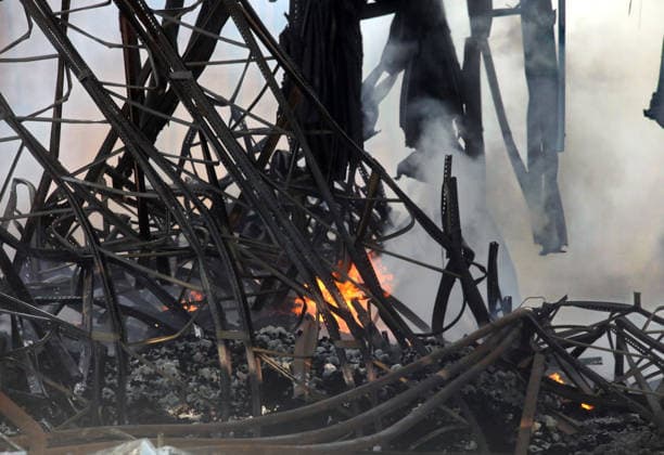 A fire rages at a logistics complex destroyed by a Russian missile strike in the village of Chaiky, Kyiv region, Ukraine, August 5, 2026. A direct hit triggered a large-scale fire that destroyed the main warehouse hub. Parking areas and freight vehicles also caught fire. (Photo by Volodymyr Tarasov Ukrinform) Russian missile strike hits logistics complex in Kyiv region  Copyright: xVolodymyrxTarasovx