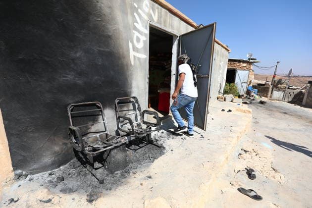 Homes burned, residents injured in Israeli settlers attack on Masafer Yatta community HEBRON, WEST BANK, PALESTINE - AUGUST 6: A Palestinian resident inspects the damage to a home that was set on fire following an attack by Israeli settlers in the Khirbet al-Tuba community in the Masafer Yatta area, south of Hebron, West Bank, Palestine on August 6, 2026. Six Palestinians, including three women, were injured and several homes were set ablaze in the attack. Wisam Hashlamoun Anadolu Hebron West Bank. Editorial use only. Please get in touch for any other usage.  Copyright: x2026xAnadoluxWisamxHashlamounx