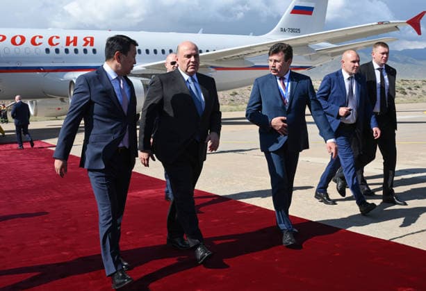 Kyrgyzstan Eurasian Intergovernmental Council 9218140 06.08.2026 Russian Prime Minister Mikhail Mishustin is welcomed by Kyrgyz Deputy Prime Minister - Minister of Water Resources, Agriculture and Processing Industry Erlist Akunbekov and Russian Ambassador to Kyrgyzstan Sergey Vakunov upon arrival at the Issyk-Kul International Airport outside Cholpon-Ata, Kyrgyzstan. Mishustin traveled to Kyrgyzstan on August 6 to attend a meeting of the Eurasian Intergovernmental Council. Kirill Zykov Sputnik Cholpon-Ata Kyrgyzstan  Copyright: xKirillxZykovx