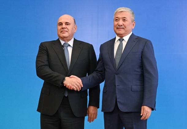 Kyrgyzstan Eurasian Intergovernmental Council 9218165 06.08.2026 Russian Prime Minister Mikhail Mishustin and Kyrgyz Prime Minister - Head of the Presidential Administration Adylbek Kasymaliev pose for photos before a narrow format meeting of the Eurasian Intergovernmental Council in Cholpon-Ata, Kyrgyzstan. Alexander Miridonov Sputnik Cholpon-Ata Kyrgyzstan  Copyright: xAlexanderxMiridonovx
