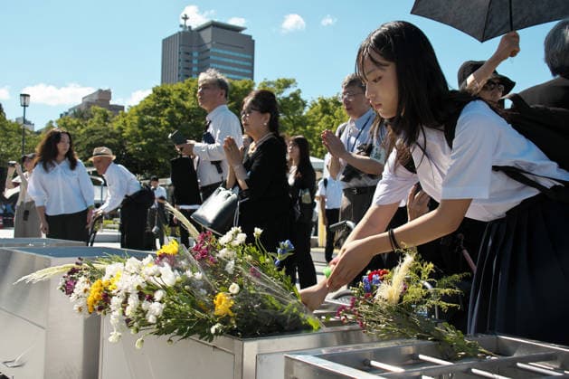 Participants offer flowers after the ceremony for the atomic bomb victims at Hiroshima Peace Memorial Park marking the 81th anniversary of the atomic bombing of Hiroshima, Japan on Thursday, August 6, 2026.  TKP2026080611 KEIZOxMORI