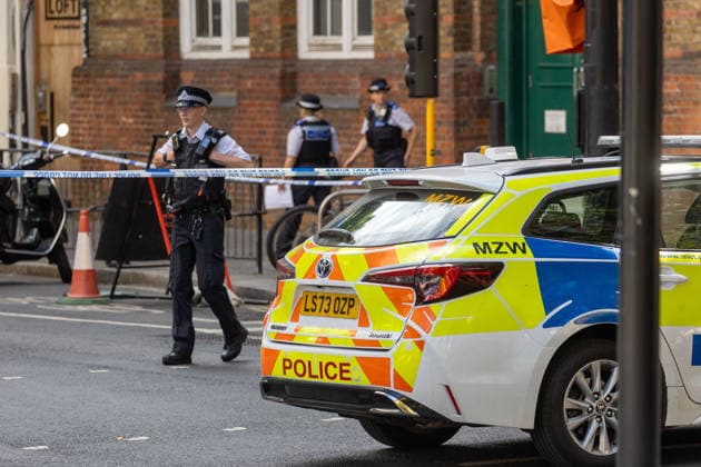 August 5, 2026, London, England, United Kingdom: Police corned off area after after four men were stabbed in Covent Garden in central London. London United Kingdom - ZUMAs262 20260805_zip_s262_022 Copyright: xTayfunxSalcix