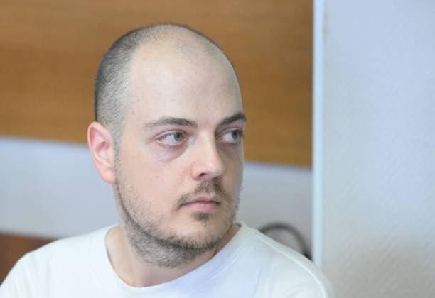 Russia Publishing House LGBT Literature Trial 9218278 06.08.2026 Former director of Popcorn Books and Individuum Print publishing houses, Dmitry Protopopov, listed as an extremist in Russia and accused of organizing the sale of LGBT-themed books, attends a hearing at the Perovsky District Court in Moscow, Russia. Ilya Pitalev Sputnik Moscow Russia  Copyright: xIlyaxPitalevx
