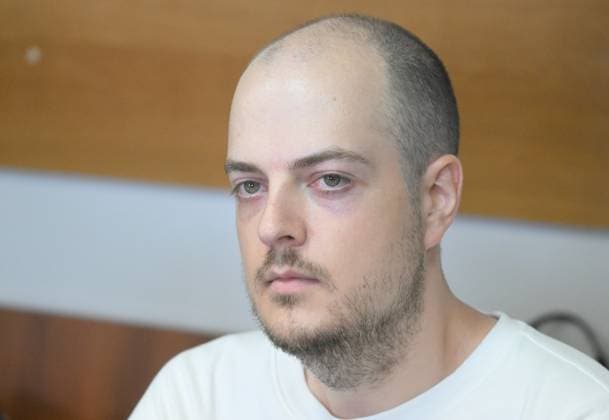 Russia Publishing House LGBT Literature Trial 9218282 06.08.2026 Former director of Popcorn Books and Individuum Print publishing houses, Dmitry Protopopov, listed as an extremist in Russia and accused of organizing the sale of LGBT-themed books, attends a hearing at the Perovsky District Court in Moscow, Russia. Ilya Pitalev Sputnik Moscow Russia  Copyright: xIlyaxPitalevx