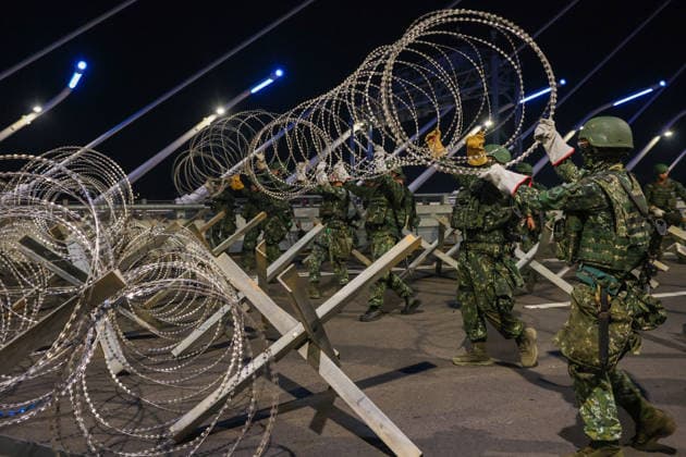 Han Kuang Military Exercise in Taiwan NEW TAIPEI, TAIWAN - AUGUST 6: Taiwanese soldiers set up anti-tank obstacles on the Danjiang (Tamkang) Bridge to simulate stopping Chinese forces from approaching, during an obstacle emplacement operation as part of the Han-Kuang military exercise, in New Taipei City, Taiwan on August 6, 2026. The 10-days long Han-Kuang exercise with unscripted training sessions test the island s defense capabilities in the event of a possible invasion by China, as Beijing has significantly increased its military activities around the Taiwan Strait and the South China Sea. Daniel Ceng Anadolu New Taipei Taiwan. Editorial use only. Please get in touch for any other usage.  Copyright: x2026xAnadoluxDanielxCengx
