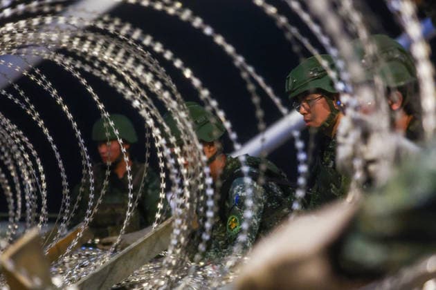 Han Kuang Military Exercise in Taiwan NEW TAIPEI, TAIWAN - AUGUST 6: Taiwanese soldiers set up barbed wires on the Danjiang (Tamkang) Bridge to simulate stopping Chinese forces from approaching, during an obstacle emplacement operation as part of the Han-Kuang military exercise, in New Taipei City, Taiwan on August 6, 2026. The 10-days long Han-Kuang exercise with unscripted training sessions test the island s defense capabilities in the event of a possible invasion by China, as Beijing has significantly increased its military activities around the Taiwan Strait and the South China Sea. Daniel Ceng Anadolu New Taipei Taiwan. Editorial use only. Please get in touch for any other usage.  Copyright: x2026xAnadoluxDanielxCengx