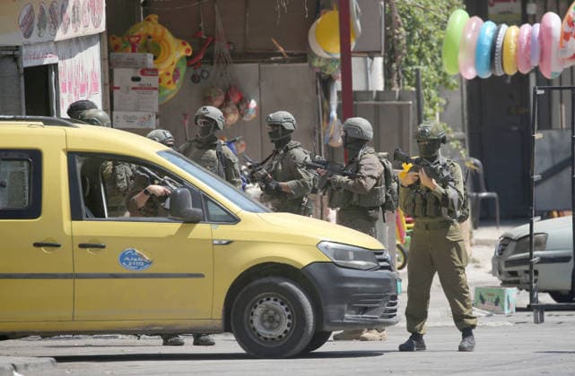 August 6, 2026, Nablus, Palestine: Israeli army forces are patrolling neighborhoods of the Askar refugee camp east of Nablus in the West Bank during a military operation. The raid is part of a broader military campaign targeting refugee camps in the West Bank. The Israeli government has threatened to occupy refugee camps, in areas under the control of Palestinian President Mahmoud Abbas. Nablus Palestine - ZUMAs197 20260806_aaa_s197_026 Copyright: xNasserxishatyehx