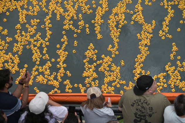 Chicago Ducky derby marks 21st anniversary CHICAGO, ILLINOIS, UNITED STATES - AUGUST 6: Thousands of rubber ducks race down the Chicago River during the 21st annual Chicago Ducky Derby in Chicago, Illinois, United States, on August 6, 2026. The annual event raised funds for Special Olympics Illinois and attracted large crowds as participants and spectators gathered along the river to mark the 21st edition of the charity race. Jacek Boczarski Anadolu Chicago United States. Editorial use only. Please get in touch for any other usage.  Copyright: x2026xAnadoluxJacekxBoczarskix
