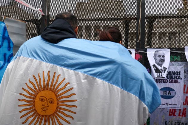 August 6, 2026, Buenos Aires, Buenos Aires, Argentina: Protesters are demonstrating outside the National Congress (Buenos Aires) against the Private Property Inviolability Bill currently being debated in the Senate. The bill includes faster evictions, stricter limits on expropriations, changes to rural land ownership rules, and modifications to environmental regulations. Demonstrators argue that it threatens land rights, environmental protections, and national sovereignty. Buenos Aires Argentina - ZUMAa188 20260806_zip_a188_003 Copyright: xPaulaxAcunzox