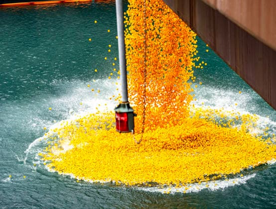 August 6, 2026, Chicago, Illinois, USA: 2026 Chicago Ducky Derby to benefit Special Olimpics. More than 90,000 rubber ducks were dumped into the Chicago River and later collected by the volunteers. Chicago USA - ZUMAk205 20260806_zmp_k205_029 Copyright: xSandraxKozintsevax