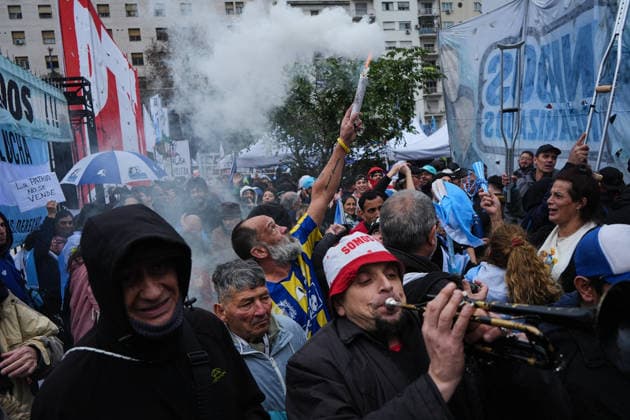Demonstration held in Buenos Aires against government s Private Property bill BUENOS AIRES, ARGENTINA - AUGUST 6: Demonstrators clash with police forces outside the National Congress during a massive mobilization called by social, union, and political organizations to reject the government s Inviolability of Private Property bill, in Buenos Aires, Argentina on August 6, 2026. Tensions escalated when a group of protesters began throwing objects at the security personnel, prompting the police to deploy water cannons to disperse the crowd outside the Legislative Palace. Although the ruling party withdrew the controversial Land Law chapter to unblock the debate in the Senate, the organizers maintain their protest, demanding that the entire  Copyright: x2026xAnadoluxLucianoxGonzalezx