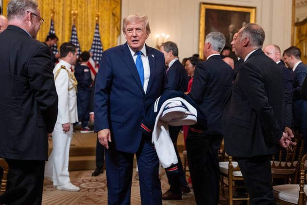 President Trump Hosts Team USA Olympians at White House United States President Donald J Trump departs an event in the East Room of the White House in Washington, DC, USA, on Thursday, August 6, 2026. President Trump is hosting a ceremony for Team USA Olympians who competed in the 2026 Olympic Winter Games in Italy. Credit: Aaron Schwartz Pool via CNP Washington District of Columbia United States  Copyright: xPool ABACAx