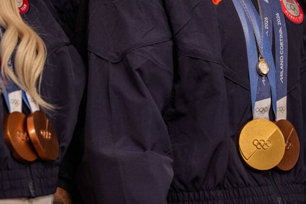 August 6, 2026, Washington, District Of Columbia, United States: Olympic medals hang from Team USA athletes during a White House event with President DONALD TRUMP honoring Olympians and Paralympians following the 2026 Milano Cortina Winter Olympic and Paralympic Games. Washington United States - ZUMAk206 20260806_znp_k206_016 Copyright: xMattxKaminskyx