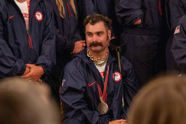 August 6, 2026, Washington, District Of Columbia, United States: Team USA Olympians stand behind President DONALD TRUMP during a White House event honoring Olympians and Paralympians following the 2026 Milano Cortina Winter Olympic and Paralympic Games. Washington United States - ZUMAk206 20260806_znp_k206_019 Copyright: xMattxKaminskyx