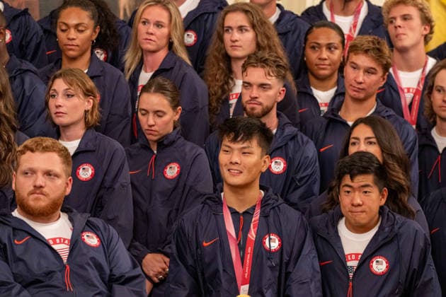 August 6, 2026, Washington, District Of Columbia, United States: Team USA Olympians stand behind President DONALD TRUMP during a White House event honoring Olympians and Paralympians following the 2026 Milano Cortina Winter Olympic and Paralympic Games. Washington United States - ZUMAk206 20260806_znp_k206_023 Copyright: xMattxKaminskyx