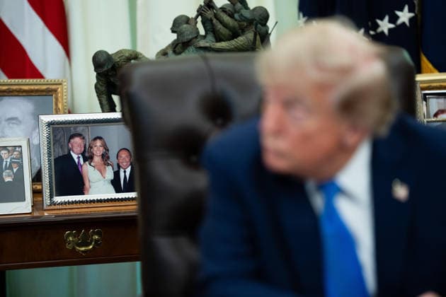 August 6, 2026, Washington, District Of Columbia, USA: Framed photos of President Trump and his family are visible during an Executive Order signing event in the Oval Office of the White House in Washington, DC, USA, on Thursday, August 6, 2026. President Trump today signed an Executive Order aiming to curtail Ã¢â‚¬oebirth tourismÃ¢â‚¬Â and birthright citizenship despite a Supreme Court opinion earlier this summer validating the 14th ammendment Washington USA - ZUMAs152 20260806_faa_s152_074 Copyright: xAaronxSchwartzx-xPoolxviaxCNPx