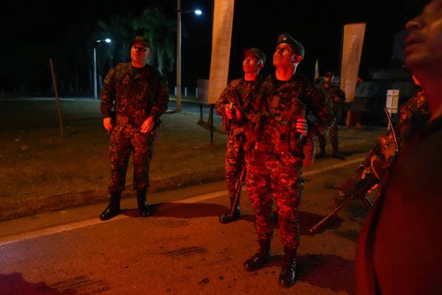 Security tightened in Cali of Colombia s presidential inauguration CALI, COLOMBIA - AUGUST 6: Soldiers stand guard at a security checkpoint at the entrance to the Valle del Cauca in Cali, Colombia on August 6, 2026. Ahead of the presidential inauguration of President-elect Abelardo de la Espriella scheduled for August 7. Colombian authorities deployed more than 11,000 police officers and soldiers across the city and surrounding access roads as part of an extensive security operation for the ceremony, which will take place at the Arena of Santiago de Cali University (USC), marking the first Colombian presidential inauguration held outside Bogota in more than a century. Juancho Torres Anadolu Cali Colombia. Editorial use only. Please get in  Copyright: x2026xAnadoluxJuanchoxTorresx