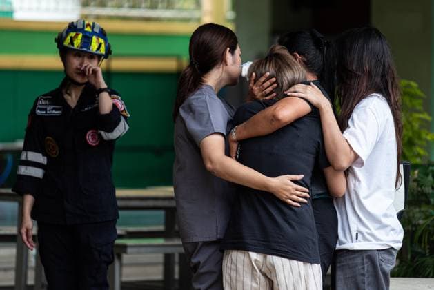 August 7, 2026, Nonthaburi, Thailand: Relatives of the victims who were killed in the school mass shooting seen crying at the scene..At least 7 people, including the gunman, died in a school mass shooting. A 14-year-old student started by killing his grandparents at their home, then opened fire at the school before killing himself. Nonthaburi Thailand - ZUMAs197 20260807_aaa_s197_014 Copyright: xPeeraponxBoonyakiatx