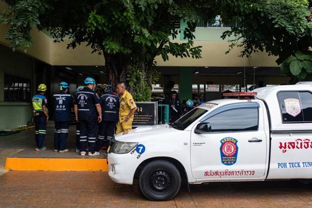 August 7, 2026, Nonthaburi, Thailand: Rescue workers seen working at the scene following a school mass shooting..At least 7 people, including the gunman, died in a school mass shooting. A 14-year-old student started by killing his grandparents at their home, then opened fire at the school before killing himself. Nonthaburi Thailand - ZUMAs197 20260807_aaa_s197_004 Copyright: xPeeraponxBoonyakiatx