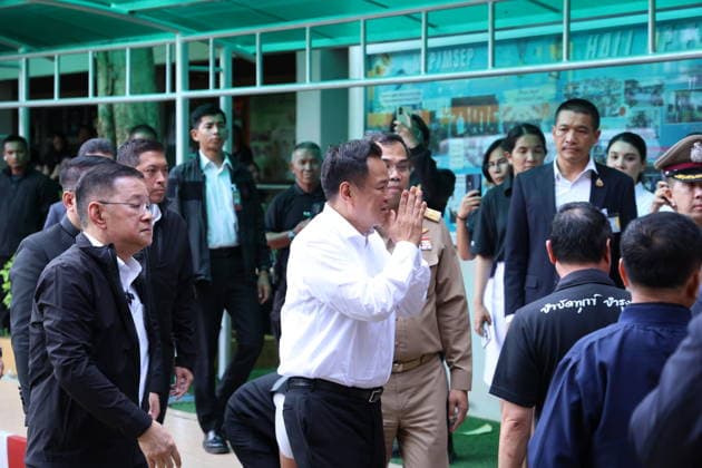 (260807) -- NONTHABURI , Aug. 7, 2026 -- Thai Prime Minister Anutin Charnvirakul (C) arrives at Debsirin Nonthaburi School in Nonthaburi province, Thailand, Aug. 7, 2026. Thai Prime Minister Anutin Charnvirakul said on Friday afternoon that eight people were confirmed dead, including the gunman and his grandparents, and over 30 people were injured, with nine in critical condition, as a gunman opened fire at a school and home in Nonthaburi province earlier the day. Local police were notified around 10 a.m. local time after a gunman opened fire at Debsirin Nonthaburi School in the Bang Kruai district of Nonthaburi province on the northwestern outskirts of Bangkok. Anutin also said such an incident must not be allowed to happen again, noting 