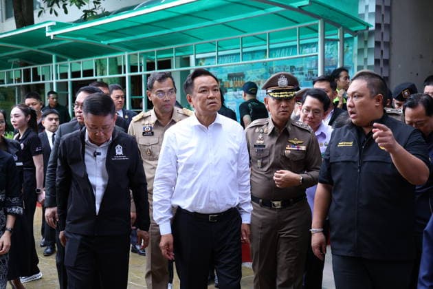 (260807) -- NONTHABURI , Aug. 7, 2026 -- Thai Prime Minister Anutin Charnvirakul (C) arrives at Debsirin Nonthaburi School in Nonthaburi province, Thailand, Aug. 7, 2026. Thai Prime Minister Anutin Charnvirakul said on Friday afternoon that eight people were confirmed dead, including the gunman and his grandparents, and over 30 people were injured, with nine in critical condition, as a gunman opened fire at a school and home in Nonthaburi province earlier the day. Local police were notified around 10 a.m. local time after a gunman opened fire at Debsirin Nonthaburi School in the Bang Kruai district of Nonthaburi province on the northwestern outskirts of Bangkok. Anutin also said such an incident must not be allowed to happen again, noting 