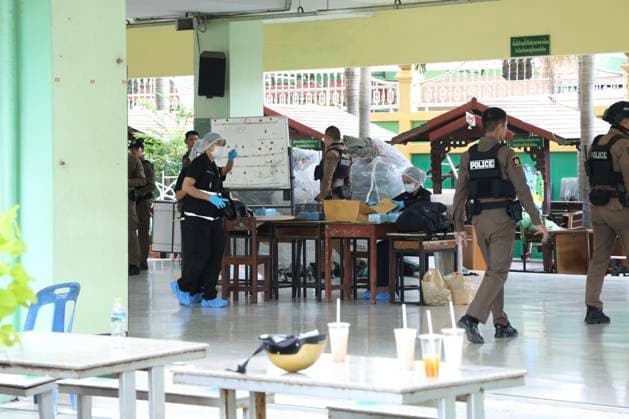 (260807) -- NONTHABURI , Aug. 7, 2026 -- Police officers work at the building where the shooting occurred at Debsirin Nonthaburi School in Nonthaburi province, Thailand, Aug. 7, 2026. Thai Prime Minister Anutin Charnvirakul said on Friday afternoon that eight people were confirmed dead, including the gunman and his grandparents, and over 30 people were injured, with nine in critical condition, as a gunman opened fire at a school and home in Nonthaburi province earlier the day. Local police were notified around 10 a.m. local time after a gunman opened fire at Debsirin Nonthaburi School in the Bang Kruai district of Nonthaburi province on the northwestern outskirts of Bangkok. Anutin also said such an incident must not be allowed to happen a 