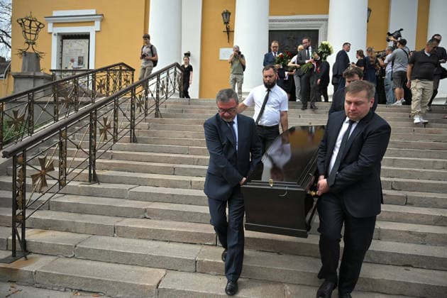 Men carry the coffin of Polish volunteer Marek Rusek-Wolski, who was killed near Kharkiv by a Russian drone attack, from the Cathedral of St Alexander after the farewell ceremony in Kyiv, Ukraine, August 7, 2026. The tragedy occurred at the end of July (approximately 27 July) near Kharkiv, when the volunteer came under a targeted Russian drone strike while on a humanitarian mission. Marek Rusek-Wolski was an administrator of the Polish volunteer community Razem dla Ukrainy. Since early 2023, he had been regularly travelling to Ukraine. He used to organise fundraisers, purchase and deliver food, medicines, hygiene products and animal feed to the most dangerous front-line settlements in the Kharkiv region. (Photo by Yevhen Kotenko Ukrinform)  Copyright: xYevhenxKotenkox