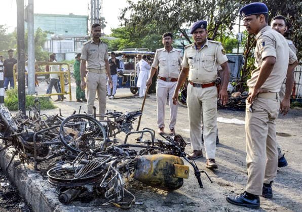 Police personnel at the site after the vehicles were set ablaze by the angry crowd following the death of a man in a road accident Patna, Aug 07 (ANI): Police personnel inspect the charred remains at the site after the vehicles were set ablaze by the angry crowd following the death of a man in a road accident at the Zero Mile area, in Patna on Friday. Patna Bihar India Copyright: xANIx ANI_20260807456