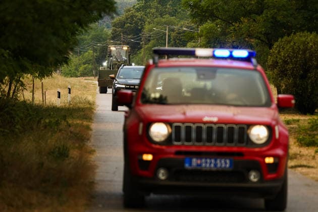 August 7, 2026, Sumarak, Vojvodina, Serbia: 202687, Sumarak, Serbia - Thick smoke rises above the landscape as a massive wildfire burns through the Deliblato Sands (Deliblatska Pescara) Special Nature Reserve. Helicopters of the Serbian Armed Forces are deployed to combat the blaze, using Bambi buckets to fetch water and extinguish the fire from the air. Deliblato Sands, often referred to as the European Sahara, is a strictly protected natural area. Sumarak Serbia  - ZUMAd223 20260807_zip_d223_002 Copyright: xMarkoxDimicx