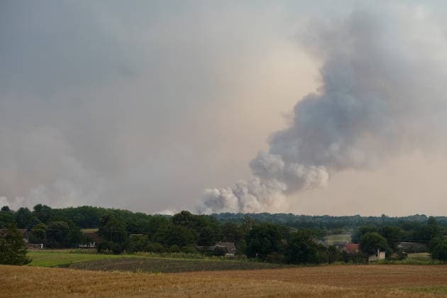 August 7, 2026, Sumarak, Vojvodina, Serbia: 202687, Sumarak, Serbia - Thick smoke rises above the landscape as a massive wildfire burns through the Deliblato Sands (Deliblatska Pescara) Special Nature Reserve. Helicopters of the Serbian Armed Forces are deployed to combat the blaze, using Bambi buckets to fetch water and extinguish the fire from the air. Deliblato Sands, often referred to as the European Sahara, is a strictly protected natural area. Sumarak Serbia  - ZUMAd223 20260807_zip_d223_013 Copyright: xMarkoxDimicx
