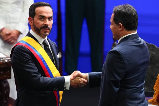 (260807) -- CALI(COLOMBIA), Aug. 7, 2026 -- Abelardo de la Espriella (L) shakes hands with Honorio Henriquez, president of the Congress and Senate during the new president s inauguration ceremony in Cali, Colombia, Aug. 7, 2026. Abelardo de la Espriella was sworn in as Colombia s new president on Friday in Cali, officially beginning his four-year term in office. (Photo by Xinhua) COLOMBIA-CALI-NEW PRESIDENT-INAUGURATION AndresxMoreno 