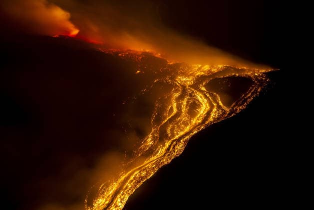 Volcanic activity intensifies at Mount Etna CATANIA, ITALY - AUGUST 8: Mount Etna enters a new paroxysmal phase characterized by intense activity at the Voragine summit crater in Catania, Sicily, Italy on August 8, 2026. The volcanic activity, which began to rapidly intensify during the evening of August 6, evolved into a powerful lava fountain overnight and into August 7. The eruption generated a significant ash cloud dispersing towards the southeast, with ashfall reported in the surrounding towns of Ragalna and Adrano. Additionally, a new lava flow was observed in the Valle del Leone from a new eruptive vent opened at an altitude of approximately 2750. The presence of volcanic ash and the elevation of the aviation alert to red severely im  Copyright: x2026xAnadoluxSalvatorexAllegrax