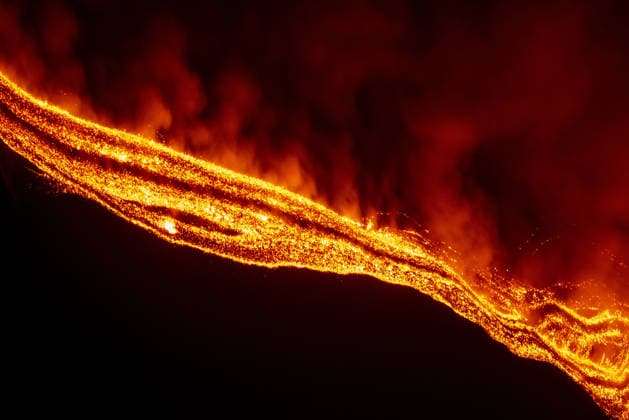 Volcanic activity intensifies at Mount Etna CATANIA, ITALY - AUGUST 8: Mount Etna enters a new paroxysmal phase characterized by intense activity at the Voragine summit crater in Catania, Sicily, Italy on August 8, 2026. The volcanic activity, which began to rapidly intensify during the evening of August 6, evolved into a powerful lava fountain overnight and into August 7. The eruption generated a significant ash cloud dispersing towards the southeast, with ashfall reported in the surrounding towns of Ragalna and Adrano. Additionally, a new lava flow was observed in the Valle del Leone from a new eruptive vent opened at an altitude of approximately 2750. The presence of volcanic ash and the elevation of the aviation alert to red severely im  Copyright: x2026xAnadoluxSalvatorexAllegrax