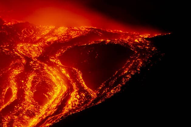 Volcanic activity intensifies at Mount Etna CATANIA, ITALY - AUGUST 8: Mount Etna enters a new paroxysmal phase characterized by intense activity at the Voragine summit crater in Catania, Sicily, Italy on August 8, 2026. The volcanic activity, which began to rapidly intensify during the evening of August 6, evolved into a powerful lava fountain overnight and into August 7. The eruption generated a significant ash cloud dispersing towards the southeast, with ashfall reported in the surrounding towns of Ragalna and Adrano. Additionally, a new lava flow was observed in the Valle del Leone from a new eruptive vent opened at an altitude of approximately 2750. The presence of volcanic ash and the elevation of the aviation alert to red severely im  Copyright: x2026xAnadoluxSalvatorexAllegrax