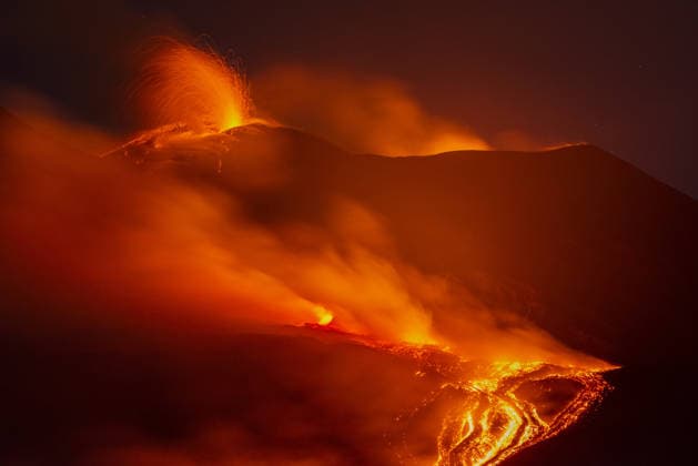 Volcanic activity intensifies at Mount Etna CATANIA, ITALY - AUGUST 8: Mount Etna enters a new paroxysmal phase characterized by intense activity at the Voragine summit crater in Catania, Sicily, Italy on August 8, 2026. The volcanic activity, which began to rapidly intensify during the evening of August 6, evolved into a powerful lava fountain overnight and into August 7. The eruption generated a significant ash cloud dispersing towards the southeast, with ashfall reported in the surrounding towns of Ragalna and Adrano. Additionally, a new lava flow was observed in the Valle del Leone from a new eruptive vent opened at an altitude of approximately 2750. The presence of volcanic ash and the elevation of the aviation alert to red severely im  Copyright: x2026xAnadoluxSalvatorexAllegrax
