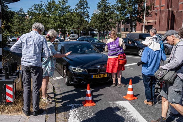 August 8, 2026, The Hague, South-Holland, The Netherlands: Extinction Rebellion activists stage an unannounced blockade of the A12 highway in The Hague, the Netherlands, in response to severe wildfires in the Netherlands. The activists are demanding that the Dutch government end fossil fuel subsidies. The Hague The Netherlands - ZUMAg281 20260808_zaf_g281_001 Copyright: xStormxGroenendijkx