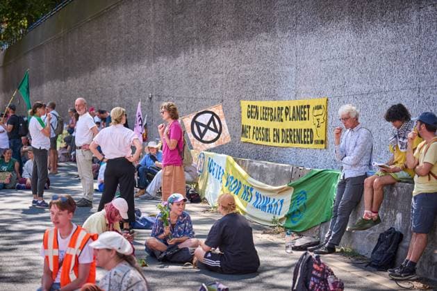 THE HAGUE - Climate protesters from Extinction Rebellion during a blockade of the A12 motorway. In a statement, XR reports that the blockade is a response to the persistent Dutch drought and the apocalyptic wildfires in France, Spain, and Limburg . PHIL NIJHUIS ANP netherlands out - belgium out  Copyright: xx x565076251x originalFilename: 565076251.jpg