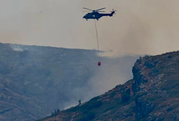 The forest fire in Tírig, Castellón, has been elevated to Level 2 under the PEIF A helicopter during efforts to extinguish a forest fire, on August 8, 2026, in Tírig, Castellón, Valencian Community, Spain. The fire in the Castellón municipality of Tírig, believed to have been caused by a lightning strike, has worsened in recent hours, forcing authorities to activate Level 2 of the Special Plan for Forest Fire Risk (PEIF) and to relocate the Advanced Command Post (PMA) there. The fire is located in a rugged area that is difficult to access by land, so aerial resources are carrying out the main firefighting efforts. AUGUST 8, 2026 FOREST FIRE Ángel Sá Tirig, Castellón, Valencian Community, Spain  Copyright: xÃngelxSanchezx 7706178
