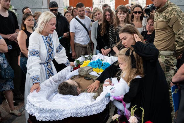 Hundreds attend the funeral of search and rescue volunteer Oleksii Yukov in Kyiv KYIV, UKRAINE - AUGUST 08: (EDITOR S NOTE: Image depicts death) Hundreds attend the funeral of search and rescue volunteer Oleksii Yukov in Kyiv, Ukraine, on August 08, 2026. Yukov was killed during a mission to retrieve the bodies of fallen Ukrainian soldiers in Donetsk region of Ukraine. Yukov had been conducting search and rescue missions to retrieve bodies of fallen Ukrainian soldiers sjnce 2014. Danylo Antoniuk Anadolu Kyiv Ukraine. Editorial use only. Please get in touch for any other usage.  Copyright: x2026xAnadoluxDanyloxAntoniukx