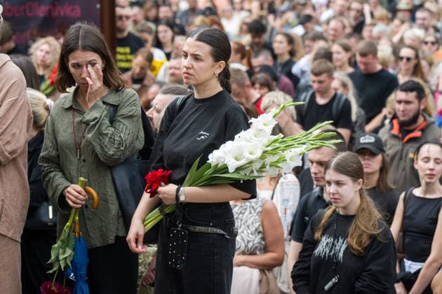 Hundreds attend the funeral of search and rescue volunteer Oleksii Yukov in Kyiv KYIV, UKRAINE - AUGUST 08: Hundreds attend the funeral of search and rescue volunteer Oleksii Yukov in Kyiv, Ukraine, on August 08, 2026. Yukov was killed during a mission to retrieve the bodies of fallen Ukrainian soldiers in Donetsk region of Ukraine. Yukov had been conducting search and rescue missions to retrieve bodies of fallen Ukrainian soldiers sjnce 2014. Danylo Antoniuk Anadolu Kyiv Ukraine. Editorial use only. Please get in touch for any other usage.  Copyright: x2026xAnadoluxDanyloxAntoniukx