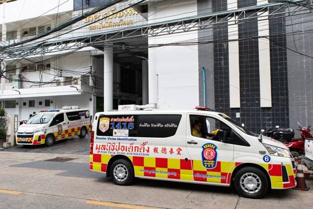 School shooting in Nonthaburi, Thailand BANGKOK, THAILAND AUGUST 8, 2026 (PHOTO ESSAY): Rescue workers, forensic personnel and grieving relatives transfer the coffins of victims from the Institute of Forensic Medicine in Bangkok following the school shooting in Nonthaburi, Thailand, on August 8, 2026. The attack left at least eight people dead and 22 others injured. The photo essay documents the release of the victims bodies to their families and the work of emergency responders and volunteers during the recovery process. BANGKOK Thailand Copyright: x xTEERAxNOISAKRANx xJNAxPressx