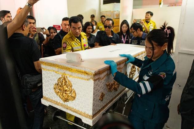 School shooting in Nonthaburi, Thailand BANGKOK, THAILAND AUGUST 8, 2026 (PHOTO ESSAY): Rescue workers, forensic personnel and grieving relatives transfer the coffins of victims from the Institute of Forensic Medicine in Bangkok following the school shooting in Nonthaburi, Thailand, on August 8, 2026. The attack left at least eight people dead and 22 others injured. The photo essay documents the release of the victims bodies to their families and the work of emergency responders and volunteers during the recovery process. BANGKOK Thailand Copyright: x xTEERAxNOISAKRANx xJNAxPressx