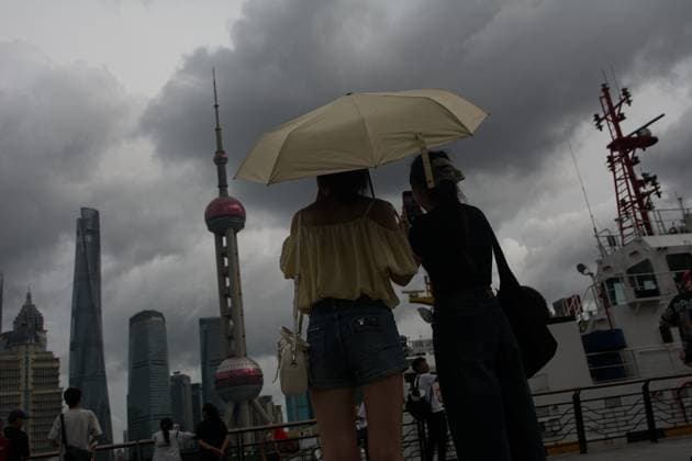 Shanghai Braces For Typhoon Dolphin General view of tourists taking selfies at North Bund in Shanghai, China, as Typhoon Dolphin approaches the country. shanghai China  Copyright: xYingxTangx originalFilename: tang-shanghai260808_np8bS.jpg